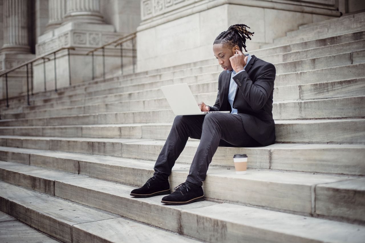 A customer checking a business website on a phone while out.